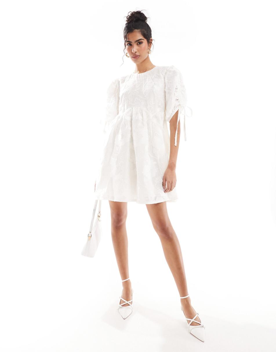 & Other Stories mini smock dress with tie detail volume sleeves in white jacquard