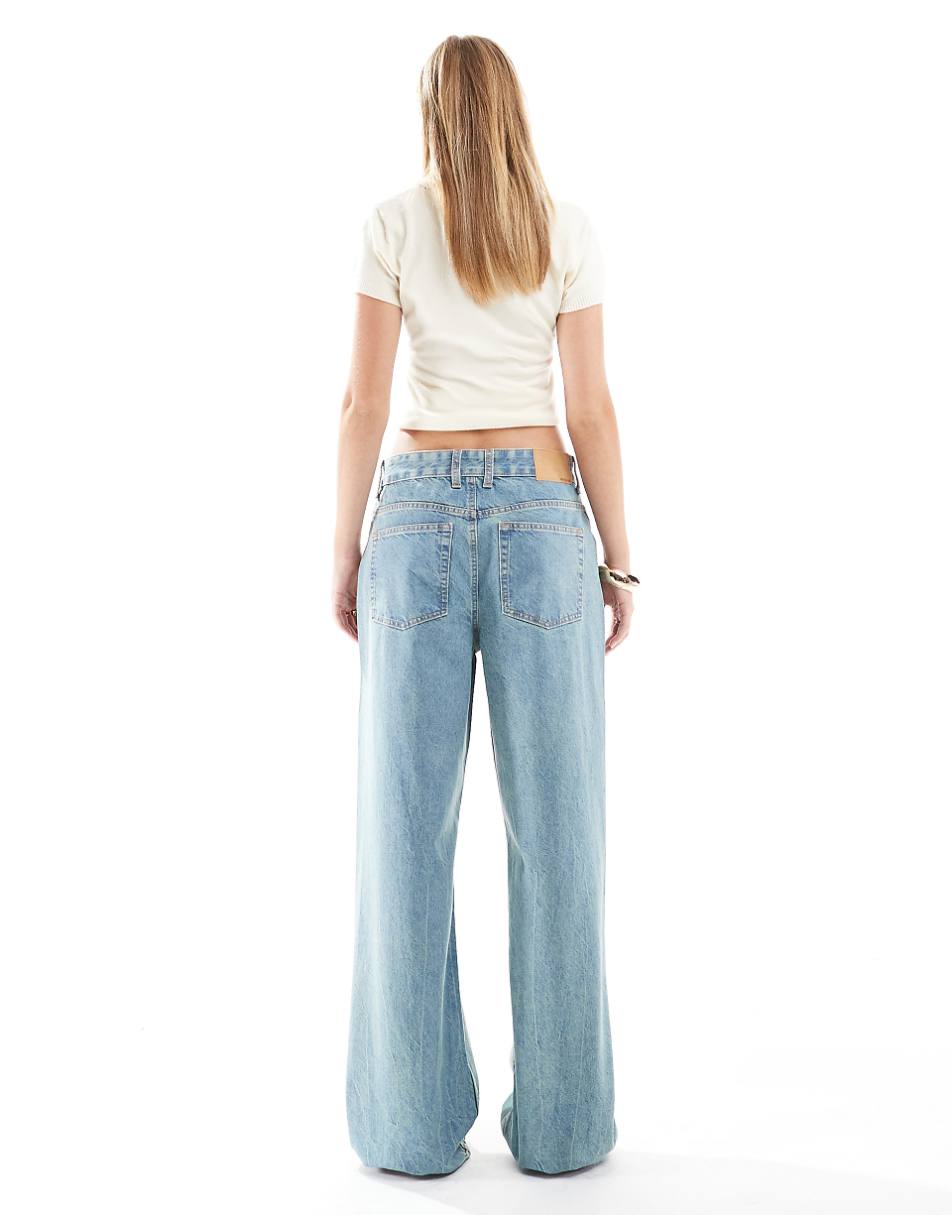 ASOS DESIGN mid rise baggy boyfriend jeans in pale tinted blue