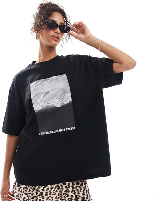 ASOS DESIGN Curve boyfriend fit T-shirt with Where Mountains Meet The Sky graphic in black