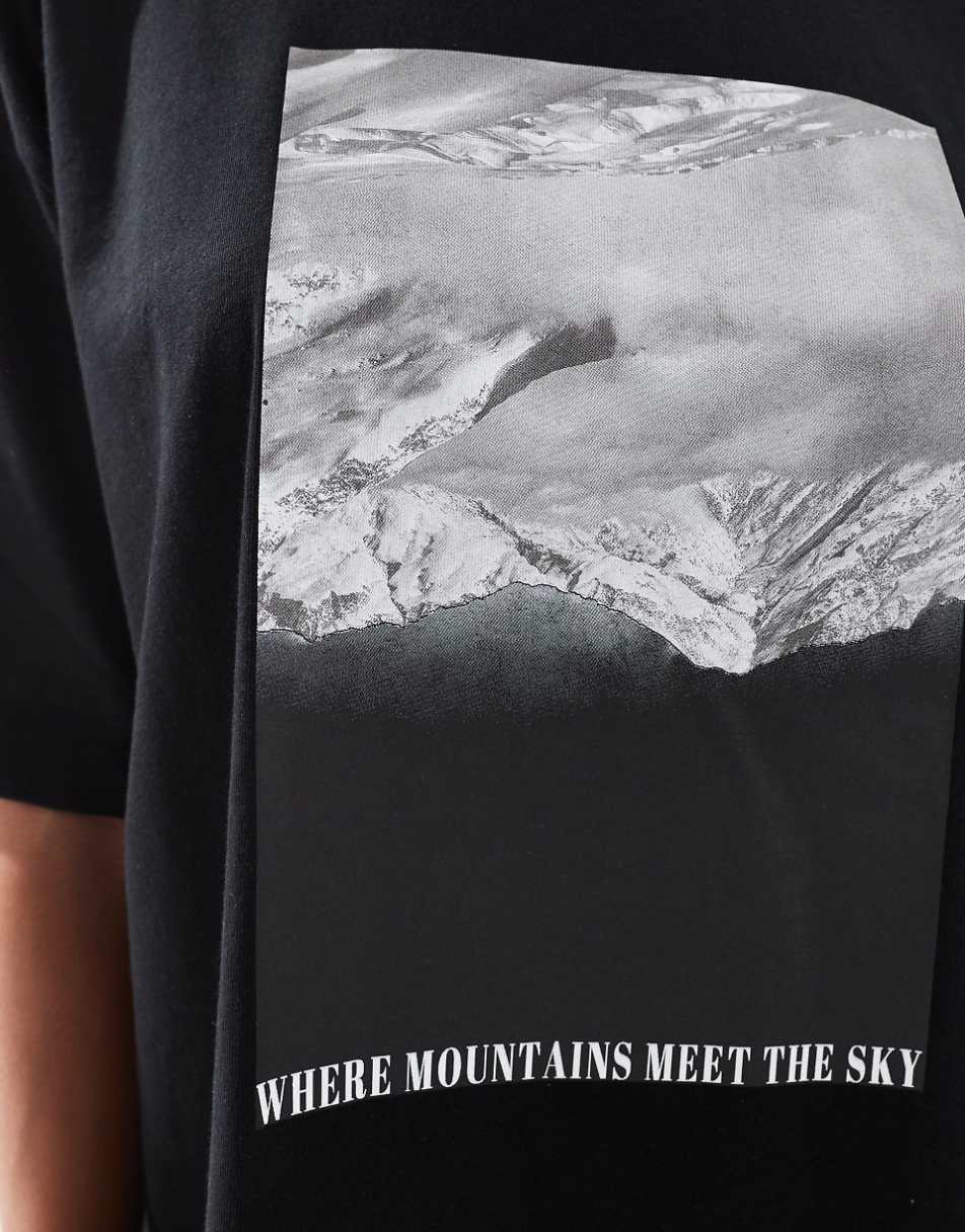 ASOS DESIGN Curve boyfriend fit T-shirt with Where Mountains Meet The Sky graphic in black