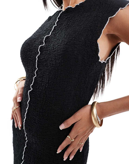 ASOS DESIGN textured midi dress with exposed seams in black