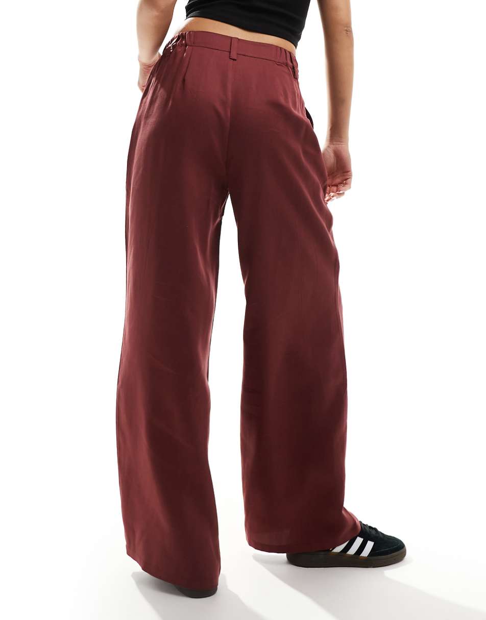 ASOS DESIGN dad pants in washed burgundy