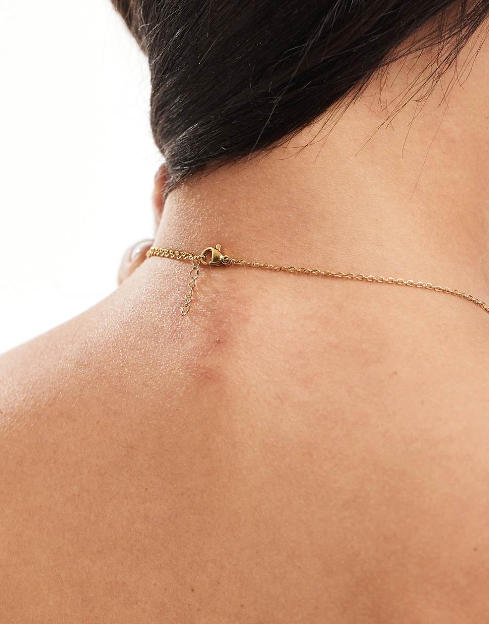 Lost Souls stainless steel bow pendant necklace in 18k gold plated