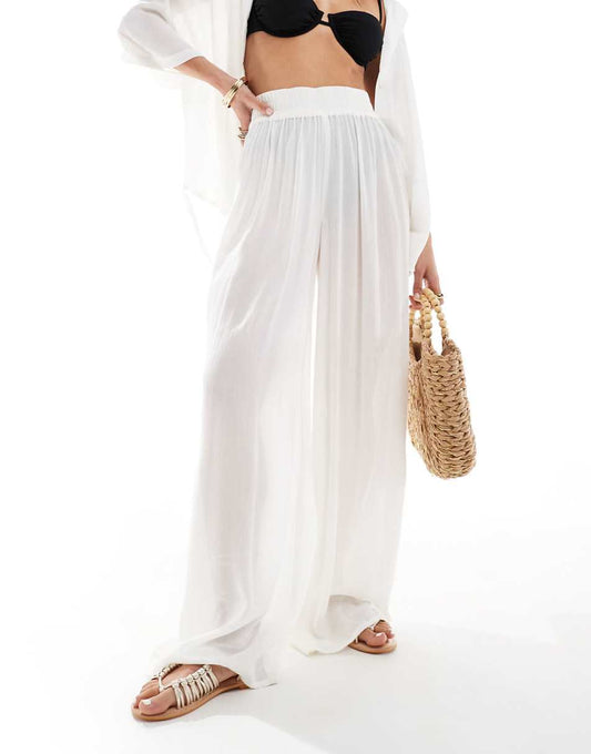 ASOS DESIGN Curve crinkle wide leg beach pants in white - part of a set