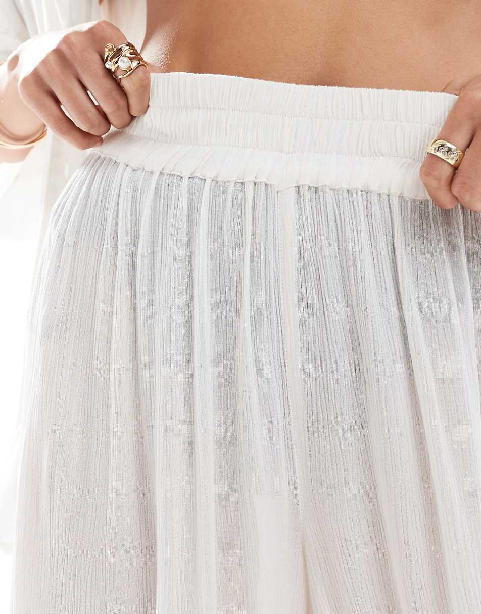 ASOS DESIGN Curve crinkle wide leg beach pants in white - part of a set