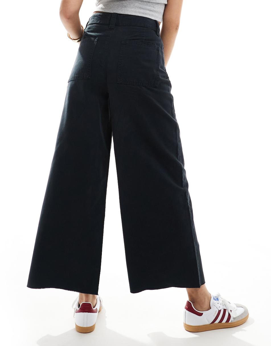 ASOS DESIGN cropped wide leg pants with raw hem in black