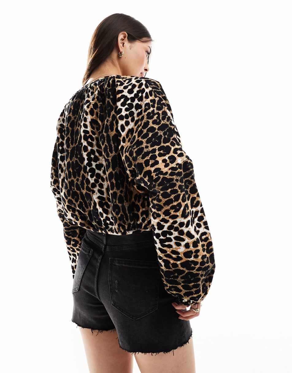 ASOS DESIGN denim bomber jacket in leopard