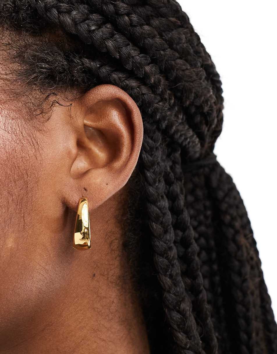 ASOS DESIGN waterproof stainless steel hoop earrings with oval design in gold tone