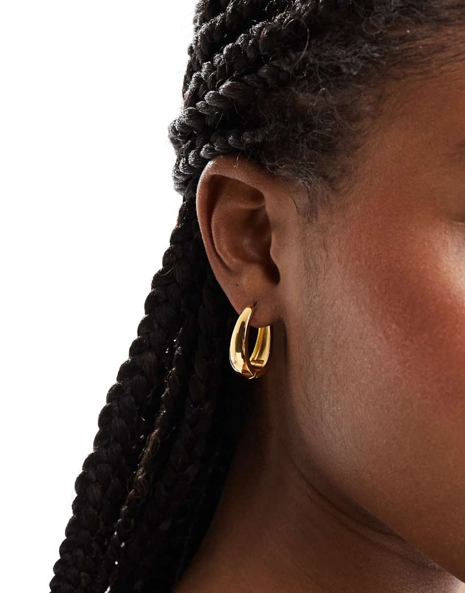 ASOS DESIGN waterproof stainless steel hoop earrings with oval design in gold tone