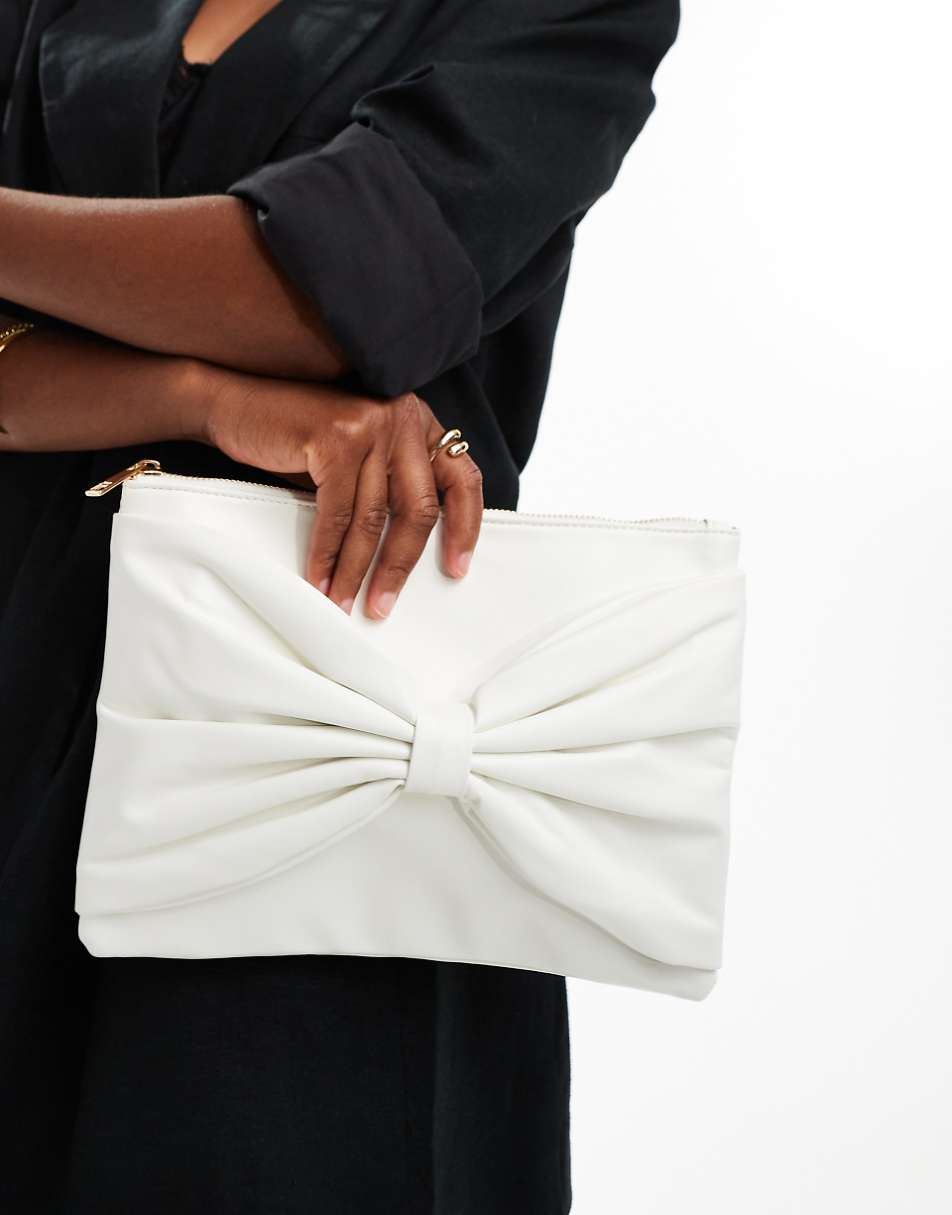 True Decadence bow front clutch bag in white