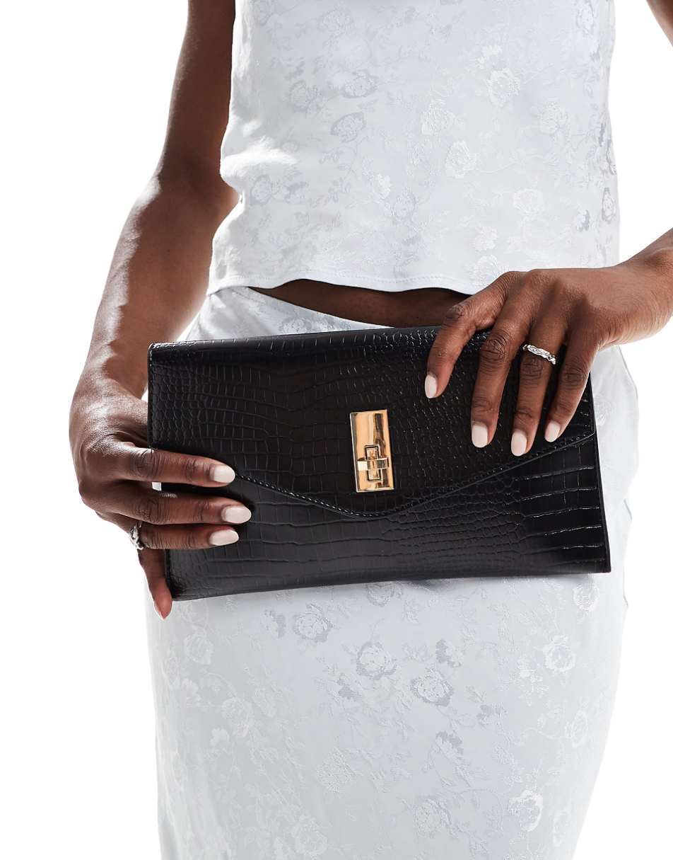 True Decadence classic clutch bag in black croc