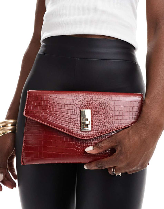 True Decadence classic clutch bag in deep red