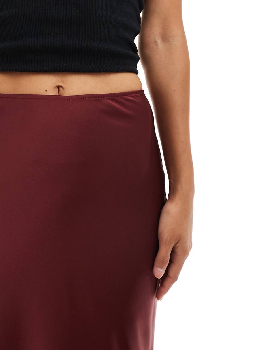 ASOS DESIGN satin bias cut maxi skirt in burgundy