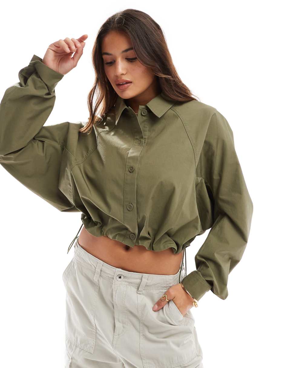 ASOS DESIGN curved hem toggle utility shirt in khaki