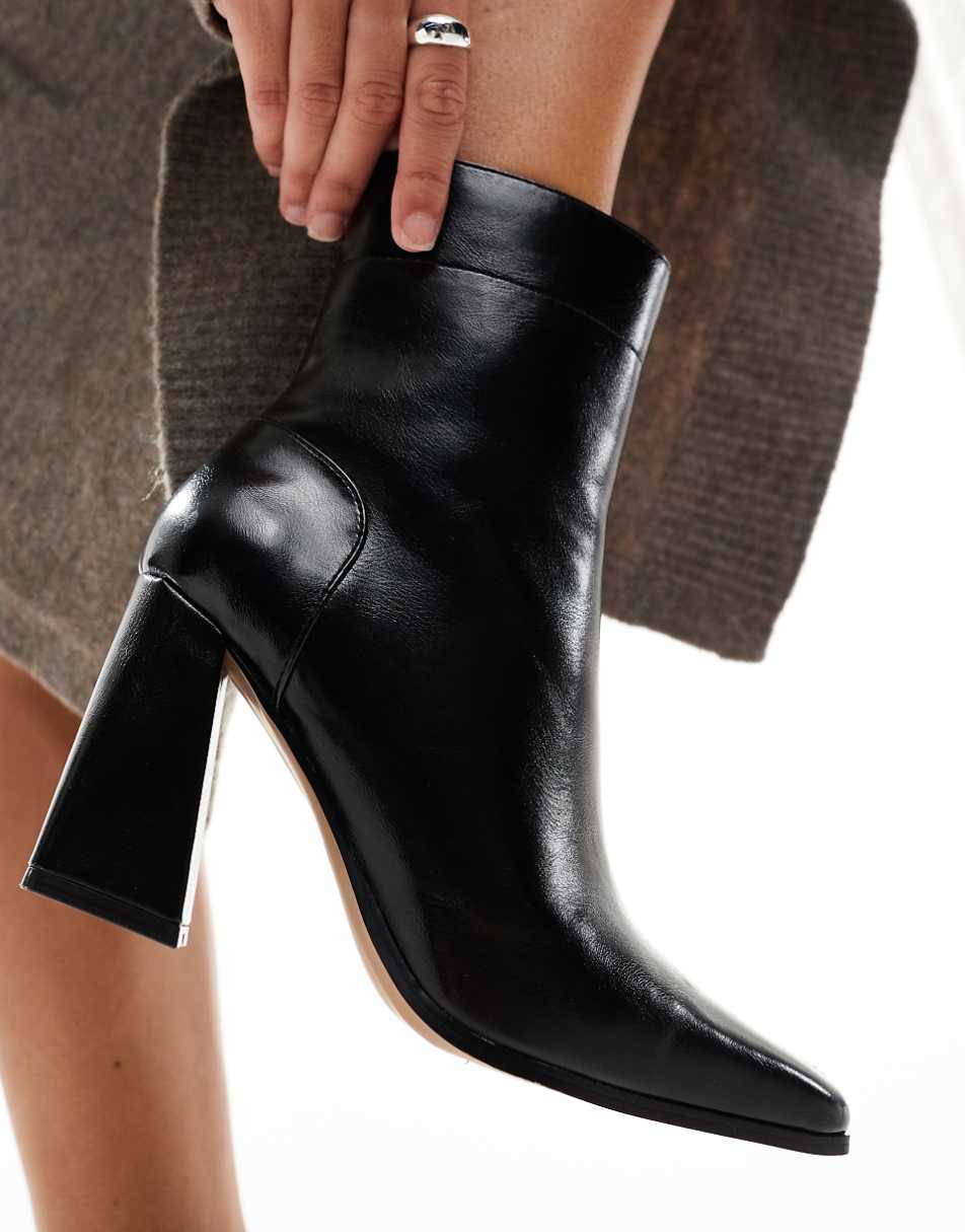 ASOS DESIGN Everest flared heel boots in black