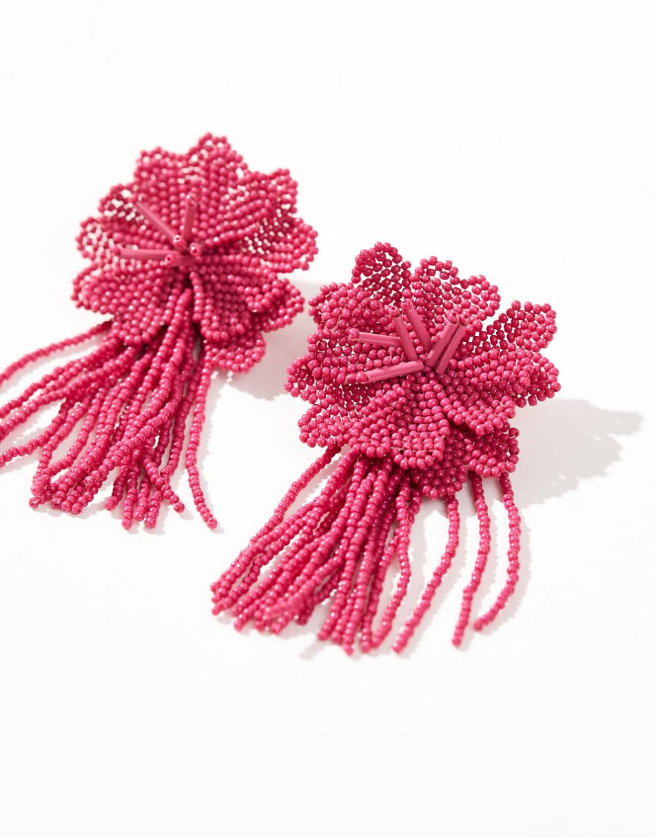 ASOS DESIGN drop earrings with beaded floral design in hot pink