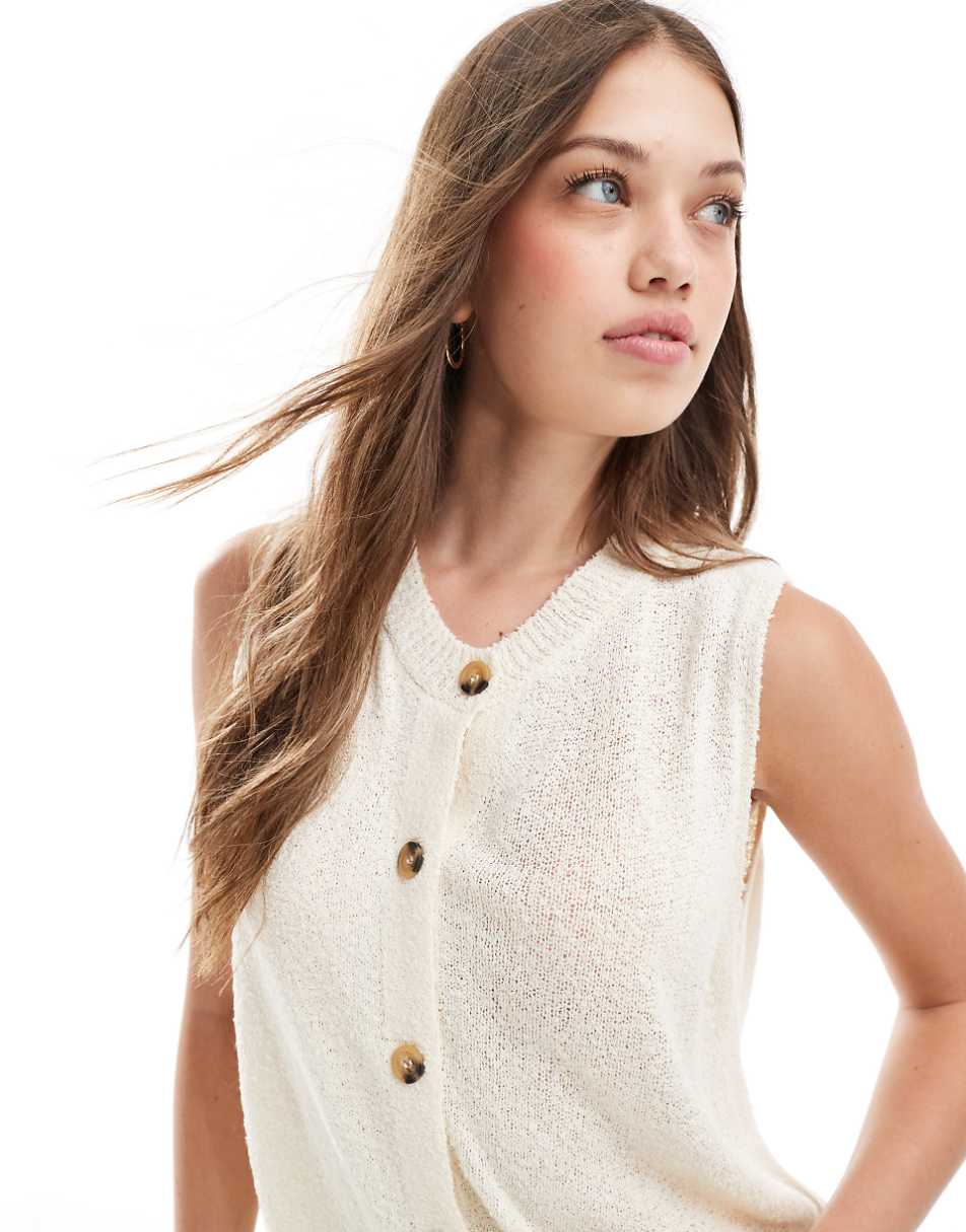 ASOS DESIGN knitted crew neck vest in textured yarn in cream