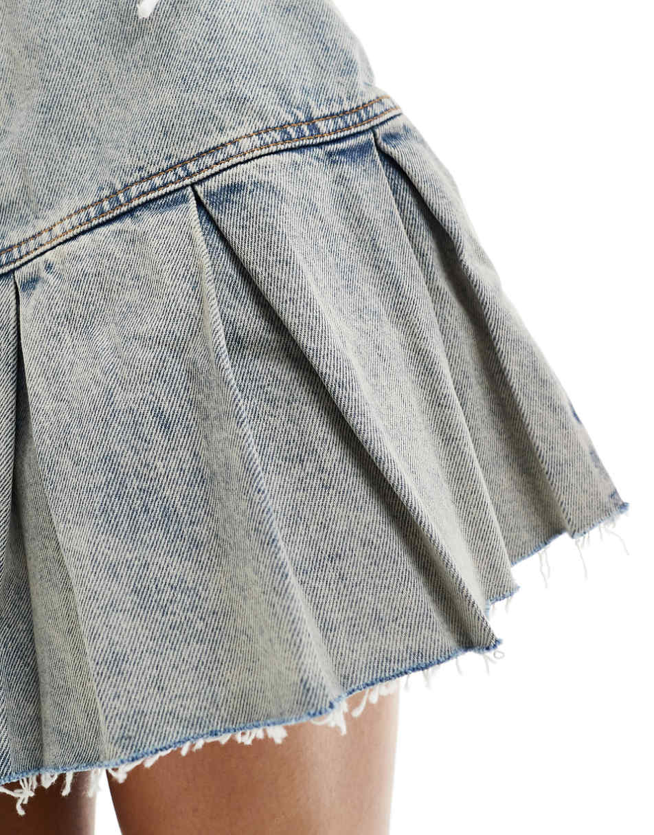 Monki low rise denim skirt with pleated raw hem in tinted blue wash