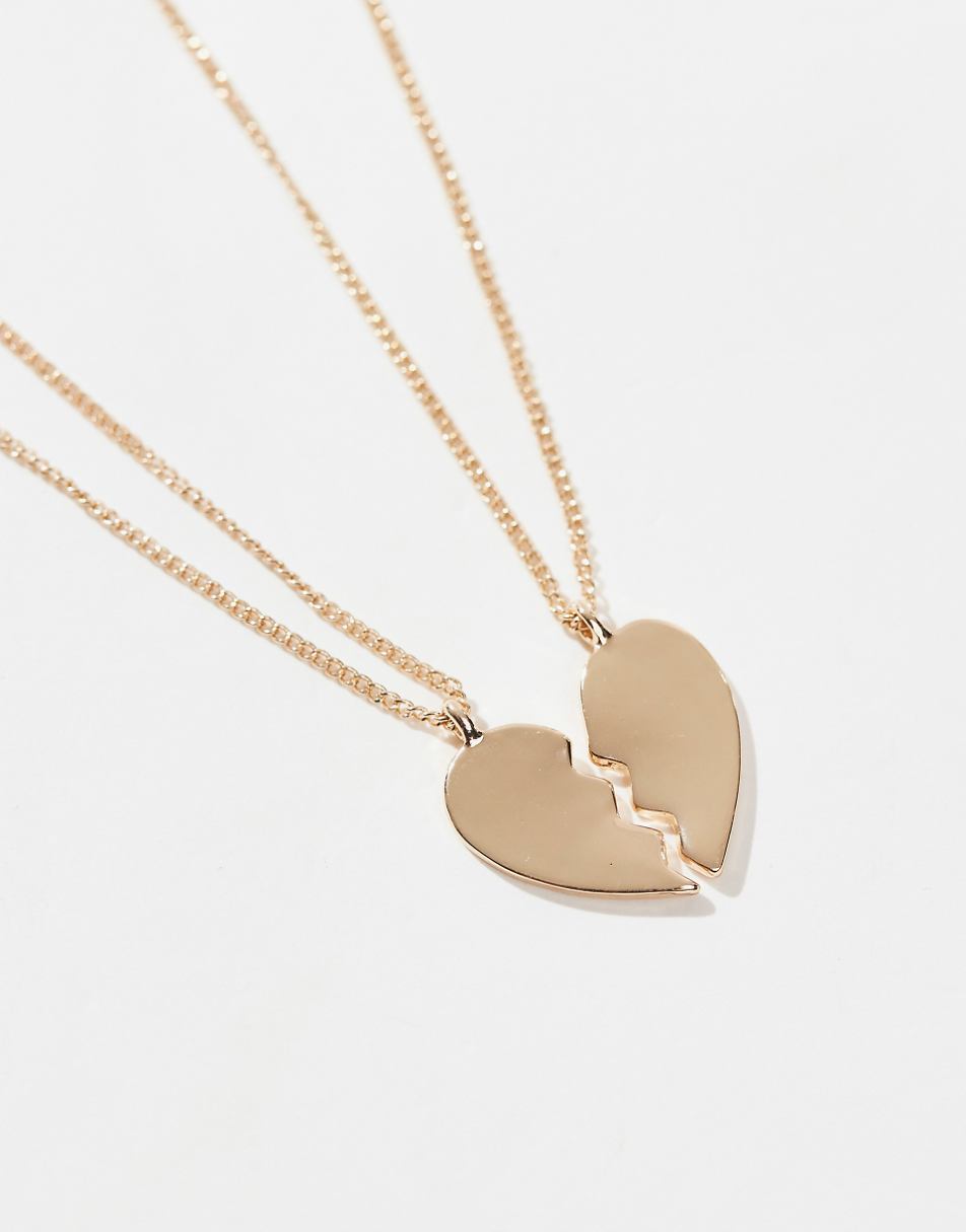Monki necklace with half heart in gold