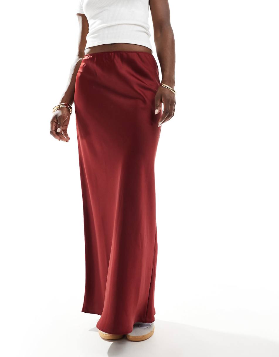 ASOS DESIGN satin bias cut maxi skirt in burgundy