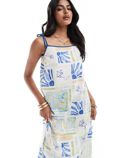 ASOS DESIGN strappy trapeze maxi dress with contrast straps in summer tile print