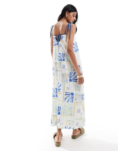 ASOS DESIGN strappy trapeze maxi dress with contrast straps in summer tile print