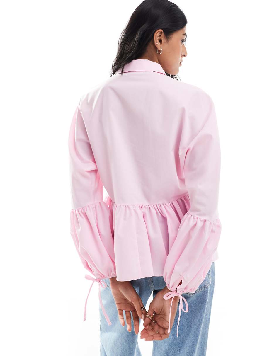 ASOS DESIGN dropped waist peplum shirt in light pink