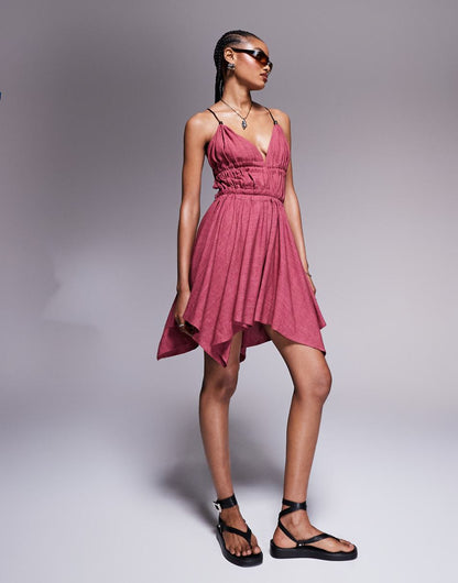 ASOS DESIGN ragged hem mini plunge dress with PU trim detail in burgundy