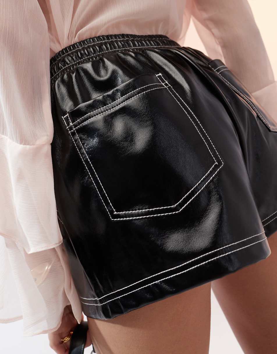 ASOS DESIGN contrast stitch vinyl shorts in black