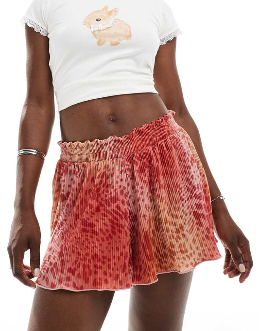 ASOS DESIGN flippy plisse shorts in pink animal print