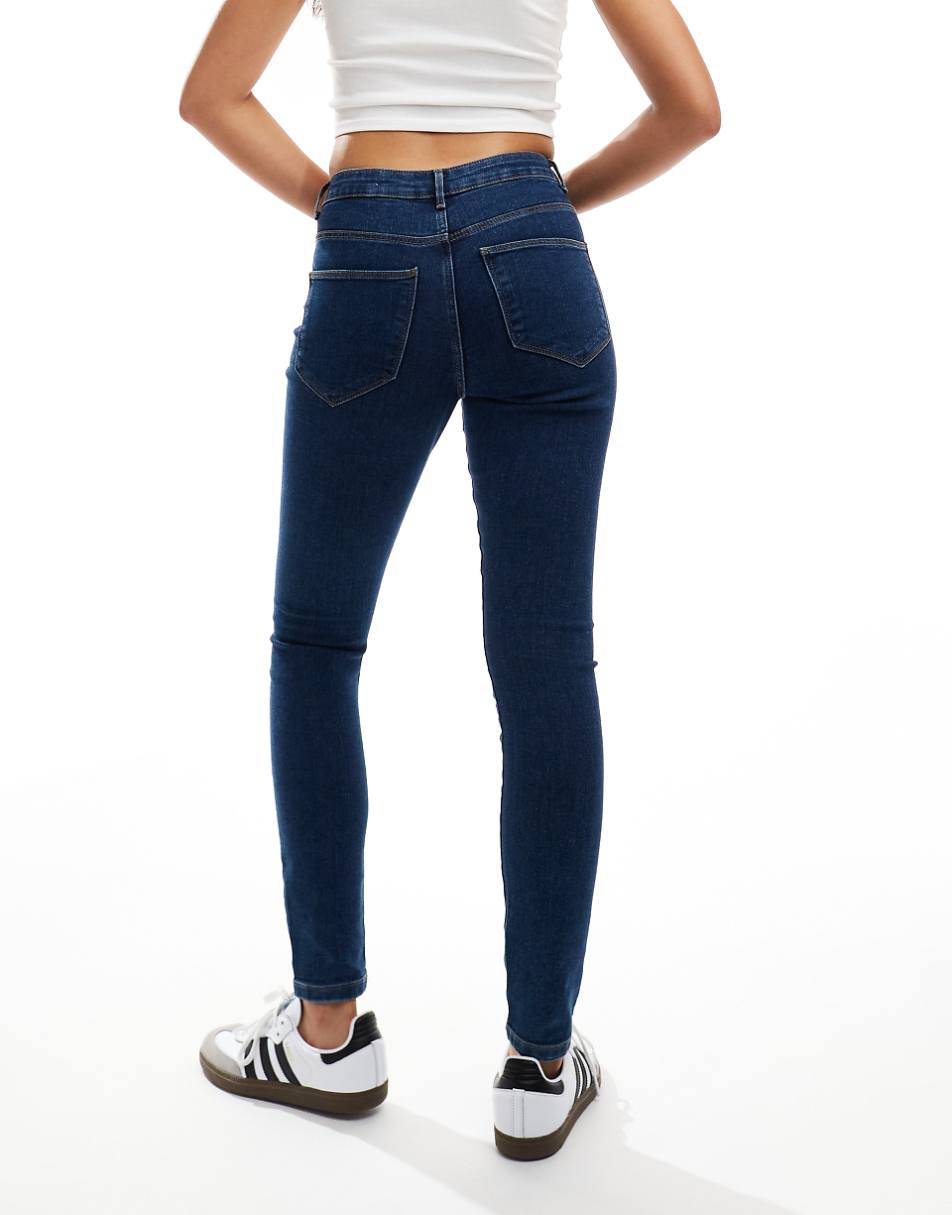 Vero Moda Elly mid rise skinny jeans in dark blue denim