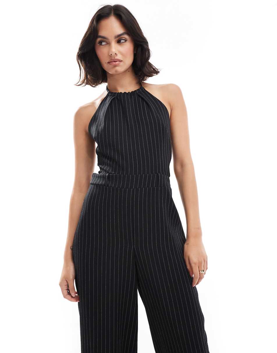 ASOS DESIGN halter tie up back jumpsuit in black and white stripe