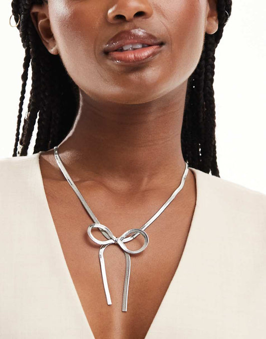 ASOS DESIGN necklace with snake chain bow detail in silver tone