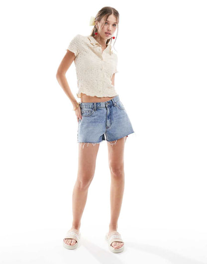 ASOS DESIGN textured polo top with lettuce edge in stone