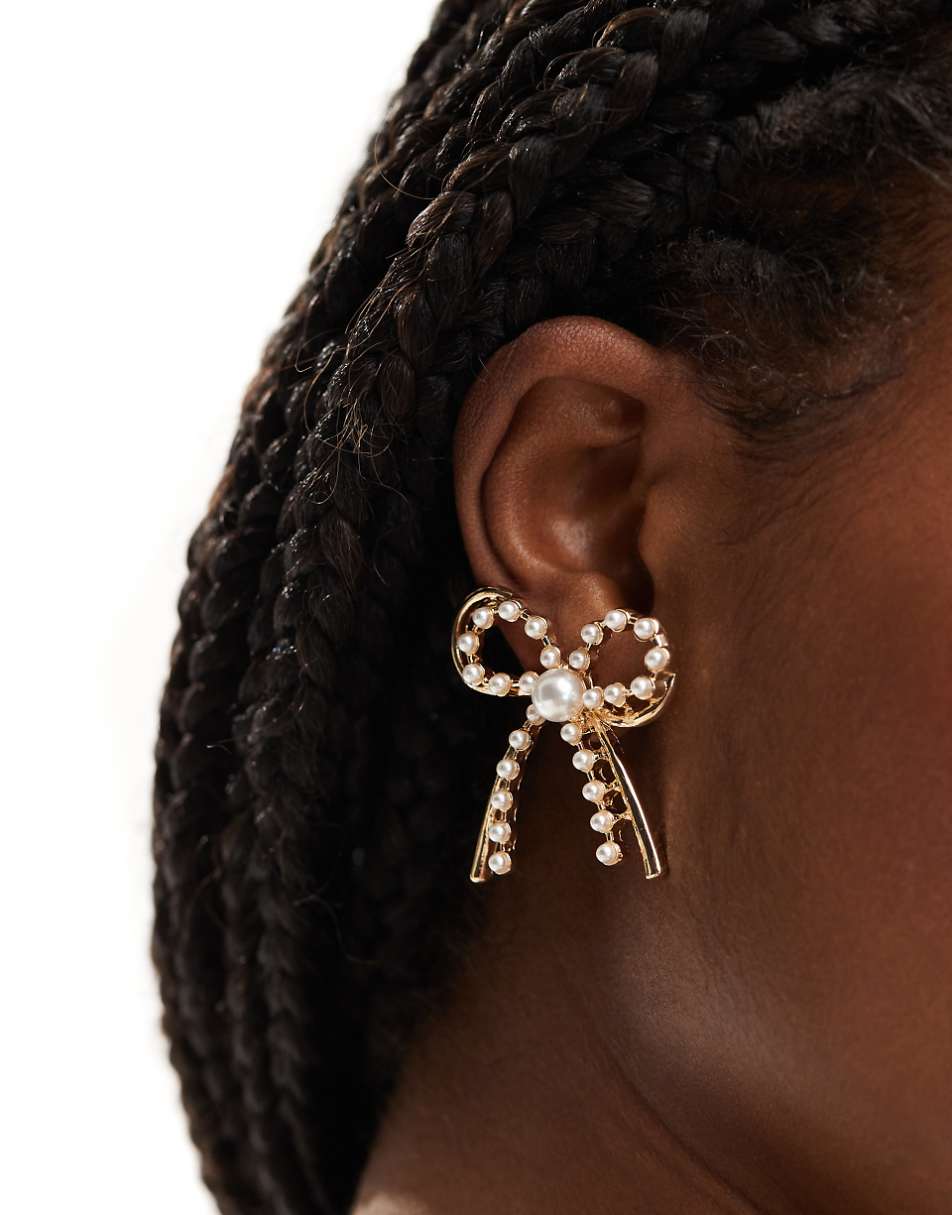 8 Other Reasons rhodium plated pearl embellished bow earrings in gold