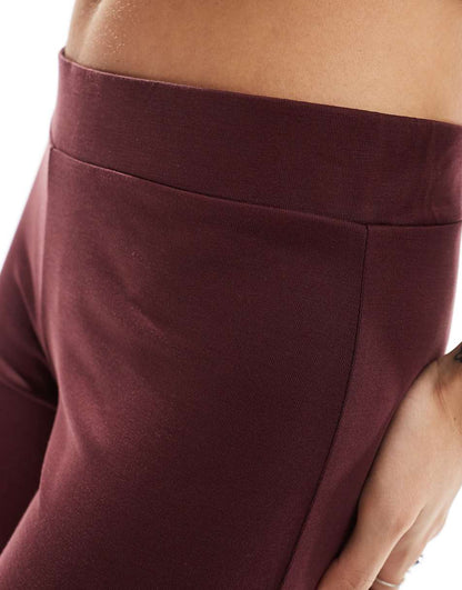 Monki super soft low waist straight leg baggy jersey pants in burgundy