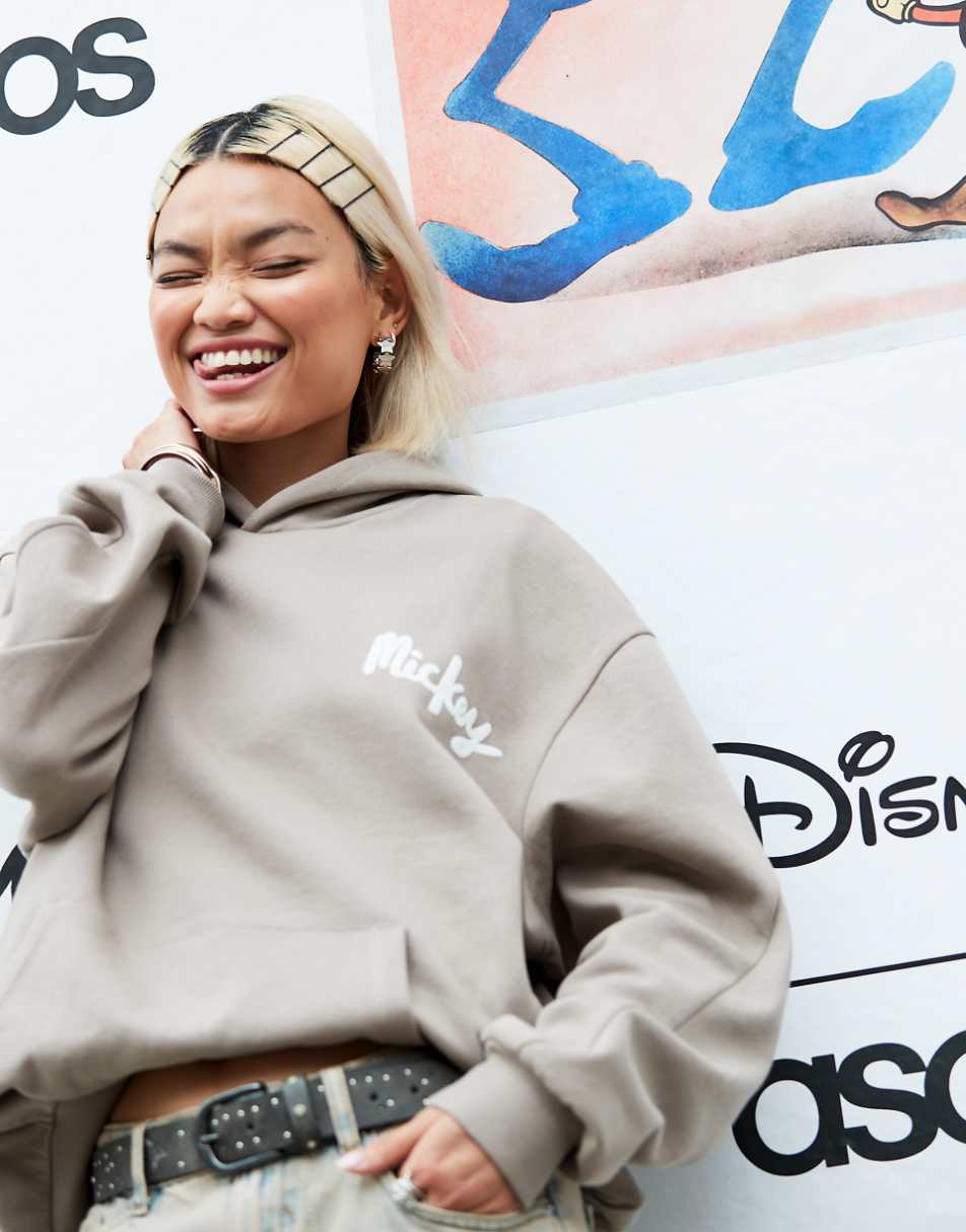 ASOS DESIGN Disney unisex oversized hoodie with Mickey Mouse prints in gray