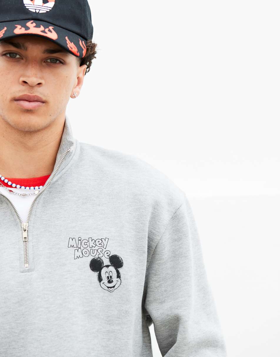 ASOS DESIGN Disney unisex oversized half zip sweatshirt with Mickey Mouse prints in gray heather