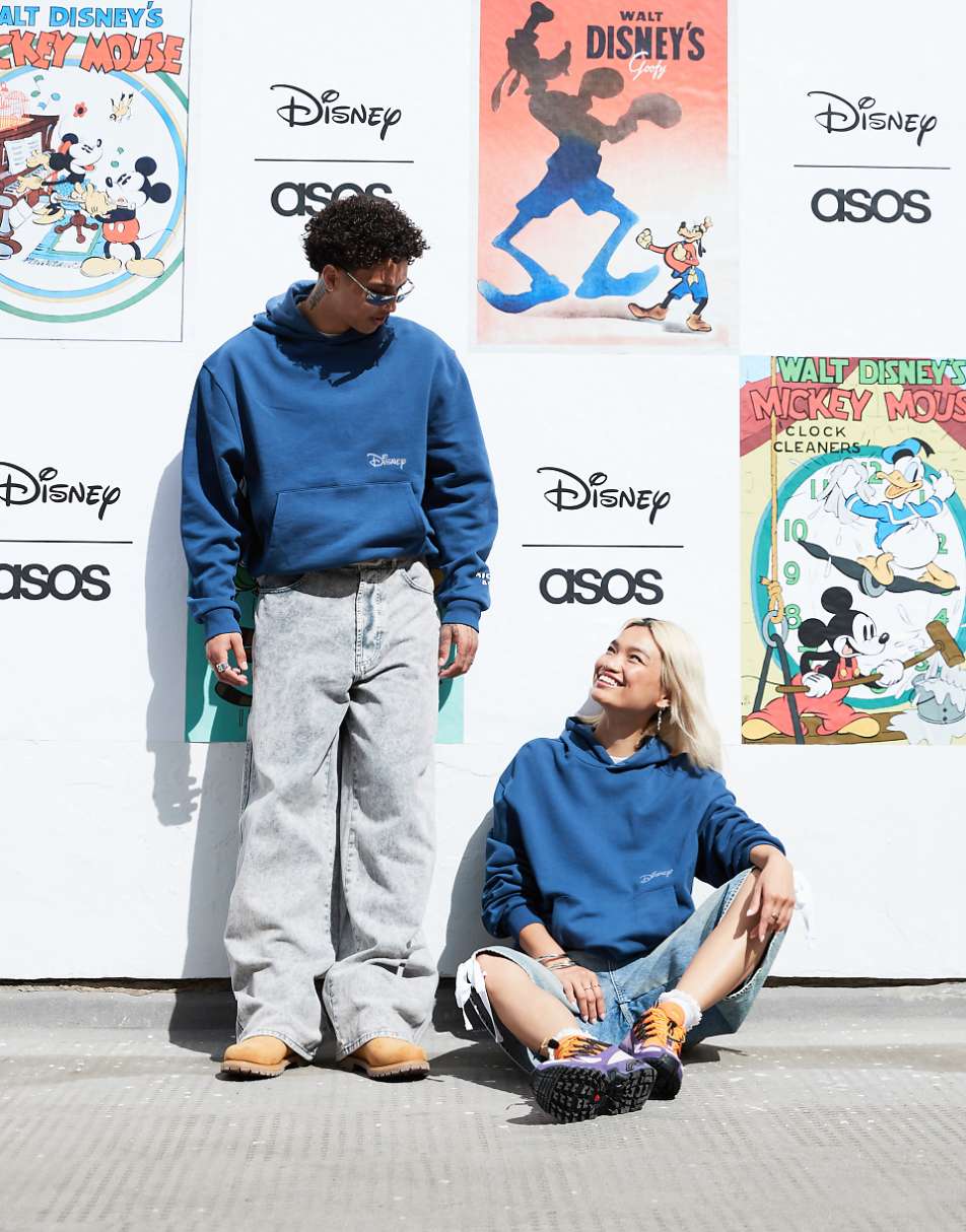 ASOS DESIGN Disney unisex oversized hoodie with Mickey Mouse & Friends prints in blue