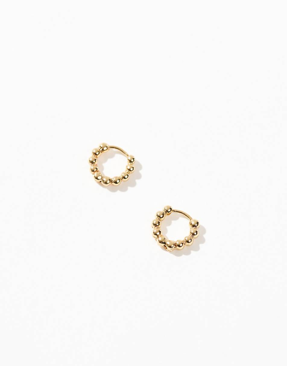 ASOS DESIGN 14k gold plated huggie hoop earrings with ball detail