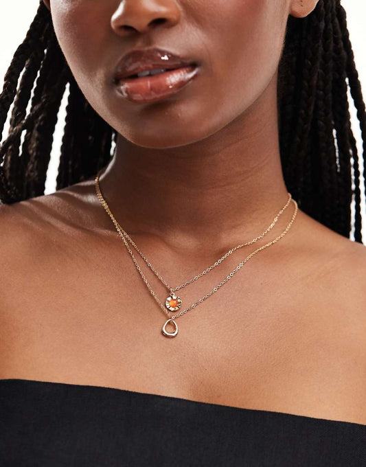 ASOS DESIGN 2-pack necklaces with red stone and circle design in gold tone