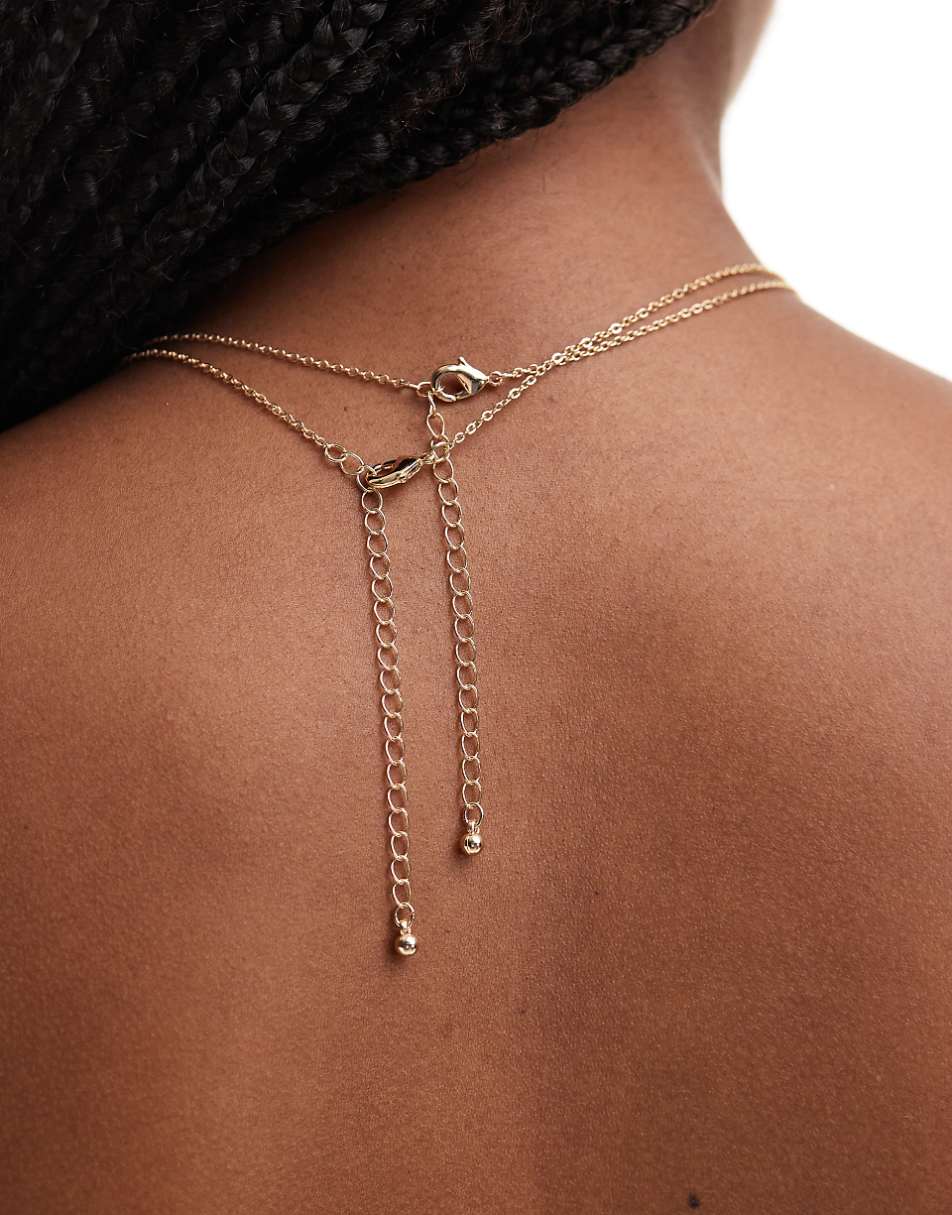 ASOS DESIGN 2-pack necklaces with red stone and circle design in gold tone