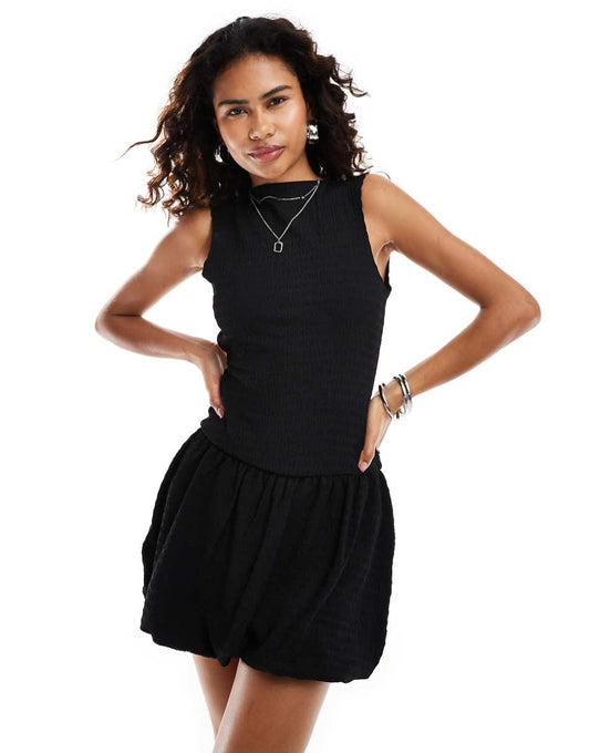 Reclaimed Vintage drop waist puffball mini dress in black