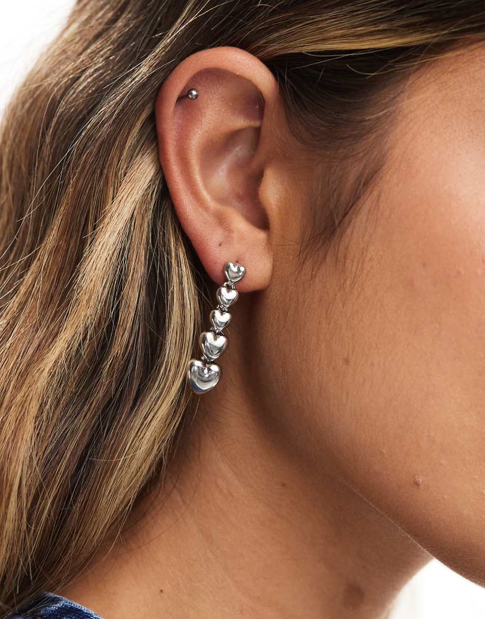 ASOS DESIGN drop earrings with multi linear heart detail in silver tone