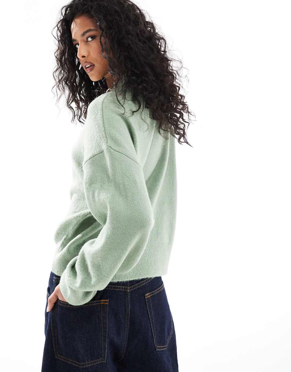 ASOS DESIGN knitted crew neck boxy sweater in green