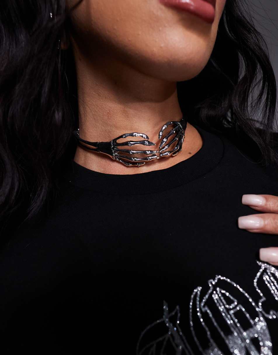 ASOS DESIGN Halloween choker necklace with skeleton hand design