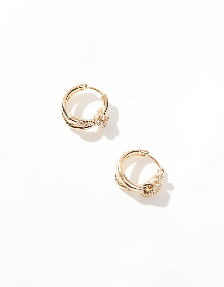 ASOS DESIGN 20mm hoop earrings with crystal knot detail in gold tone