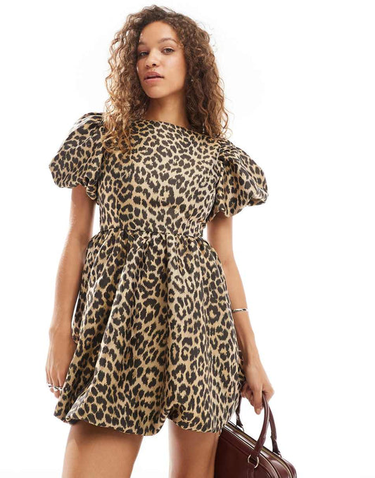 Sister Jane puff sleeve bubble jacquard mini dress in leopard