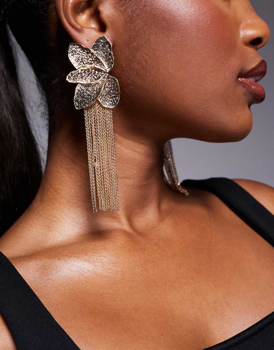 ASOS DESIGN drop earrings in textured petal design with chain tassels in gold tone